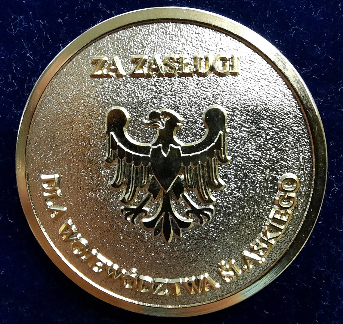 Złota Odznaka Honorowa za Zasługi dla Województwa Śląskiego nadawana przez Sejmik Województwa Śląskiego